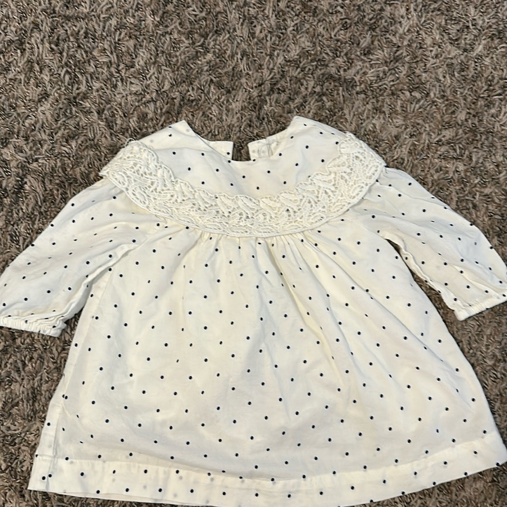 Barely worn baby gap dress. Navy blue dots. Non smoking no pets home.